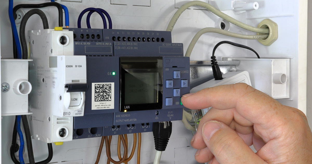 Industrial controller with an added Data Matrix code and printed example address for DEV-042